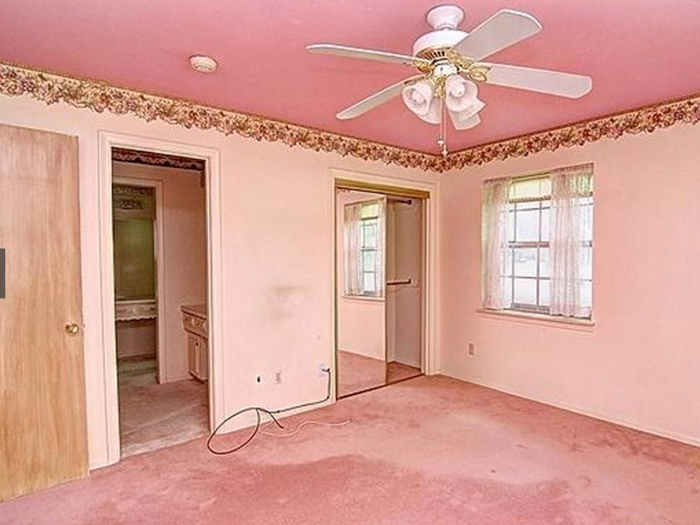 Some rooms need more work than others. In one master bedroom, it took Griffis about 12 hours to remove the border strip along the top of the walls.