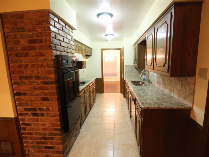 Another kitchen remodel she worked on had several issues — narrowness, poor lighting, lack of counter space, and a non-functional pantry.