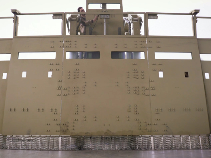 9. This "shield special vehicle," a crowd control truck designed for the Russian police for riot control. It is apparently equipped with a protected cabin, water cannon, steel shield, and can deploy a huge fold-out wall to block rioters.