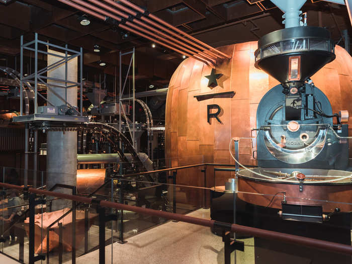 Coffee beans were being sent all around the store through a series of tubes that Chief Design Officer Liz Muller told reporters are "inspired by the history of the Meatpacking District."