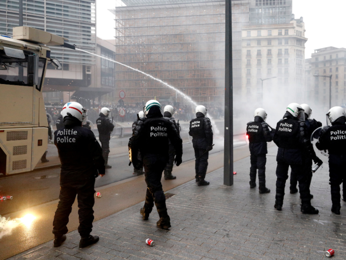 Police responded with a water cannon as they attempted to take control of the situation.