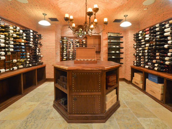 The Tuscany-styled wine cellar holds up to 1,400 bottles.