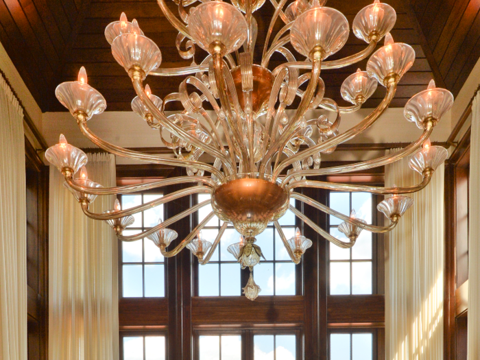 ... and luxe touches like this 300-year-old Murano glass chandelier.