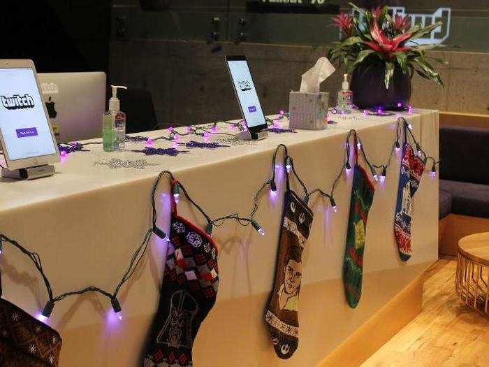 Twitch asks visitors to sign a non-disclosure agreement at the front desk when they visit. When we visited, that desk was all decked out with festive stockings and lights for the holidays.