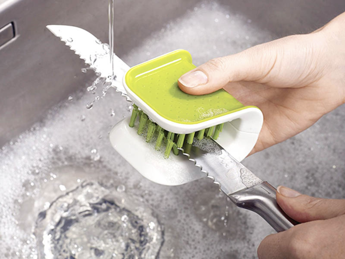 A brush that lets you clean sharp cutlery safely.