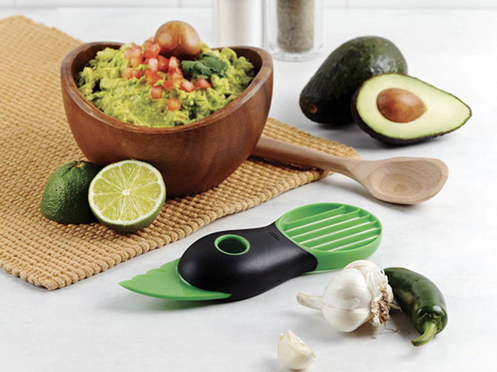 A tool that splits, pits, and slices avocados.