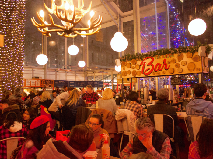 Many people had apparently been drawn to the warmth, food, and alcohol inside. But there were still places to sit here and there.