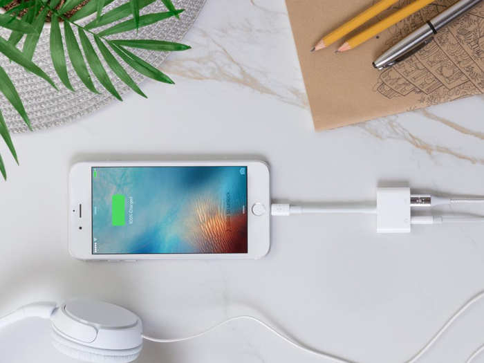 A charging and headphone adapter for the iPhone