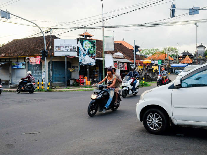 I drove east on the island, far from Ubud and the southern beaches where tourists usually go. Doing so gave me a view of the parts of the island where life goes on without benefits of the boom. I learned a lot, like how to pass through a Balinese intersection. The traffic is constant, but somehow everyone knows whose turn it is to go.