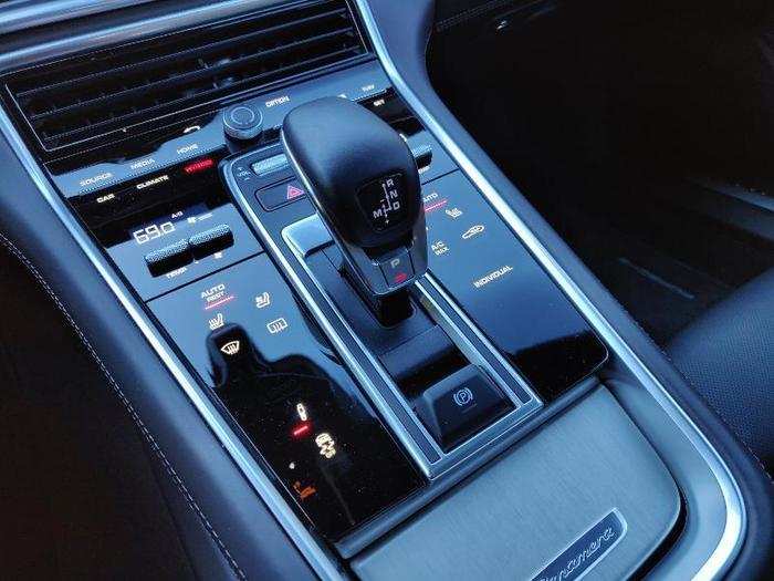 The panel is home to a variety of controls ranging from audio and climate controls to seat heaters and suspension settings.