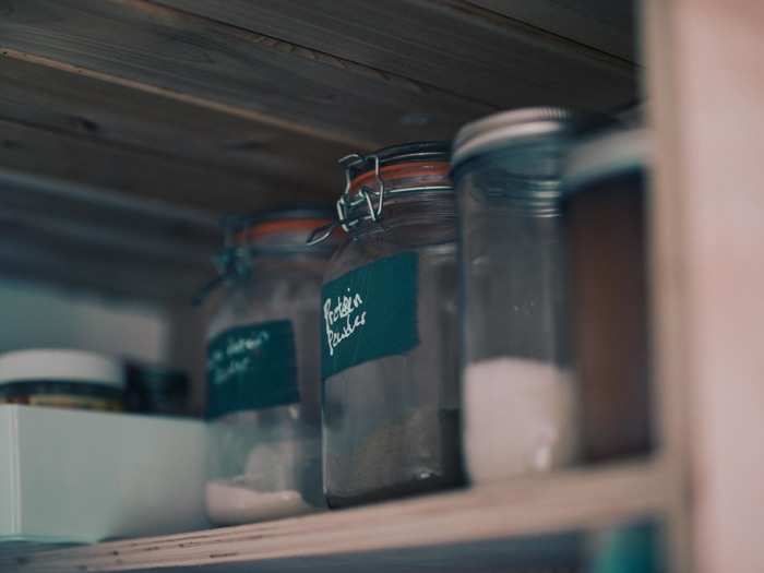 Abiding by his zero-waste philosophy, he keeps ingredients in tidy mason jars in a pantry that will soon double as his bathroom.