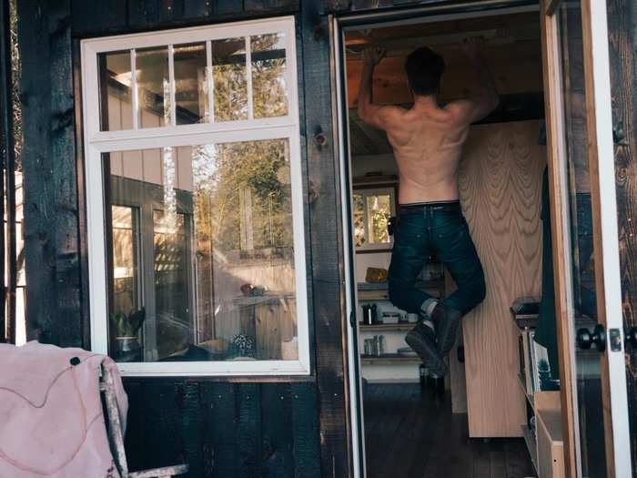 Duncan is a self-proclaimed morning person and wakes up around 6 a.m. each day. He squeezes in a 15-minute meditation session and some stretching before heading downstairs for his "tiny house workout routine," which includes chin-ups on the rafters and sit-ups with feet tucked under the kitchen counter.