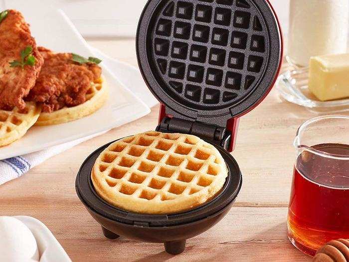 A mini, functional waffle maker that takes up minimal countertop space