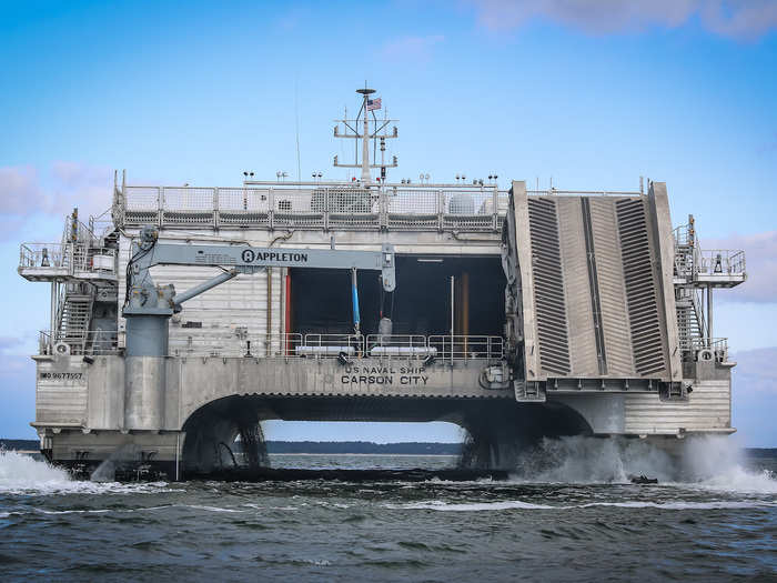 "We are embarked not only for command and control, but there’s boats; there’s unmanned underwater vehicles; there’s dive equipment," said Navy Cmdr. Oliver Herion aboard the USNS Carson City during the exercise. "The Carson City is optimal to load those assets in one port, quickly move them to another port to offload and conduct follow-on operations either ashore or afloat."