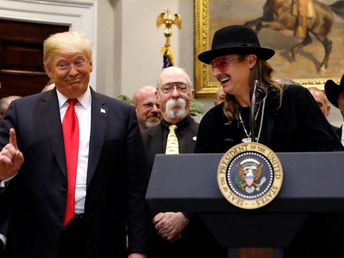 October 11, 2018: President Trump is joined by former Doobie Brothers and Steely Dan guitarist Jeff "Skunk" Baxter and Kid Rock for the signing of the "Orrin G. Hatch-Bob Goodlatte Music Modernization Act" in the White House.