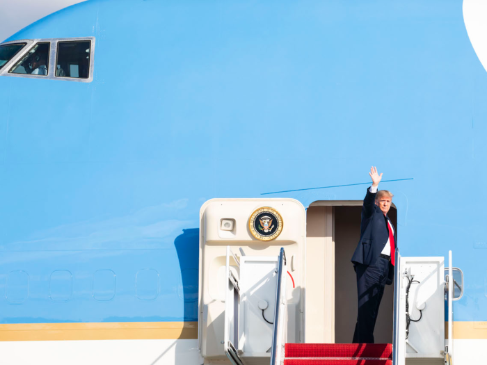 Oct. 1, 2018: Trump waves as he boards Air Force One at Joint Base Andrews in Maryland.