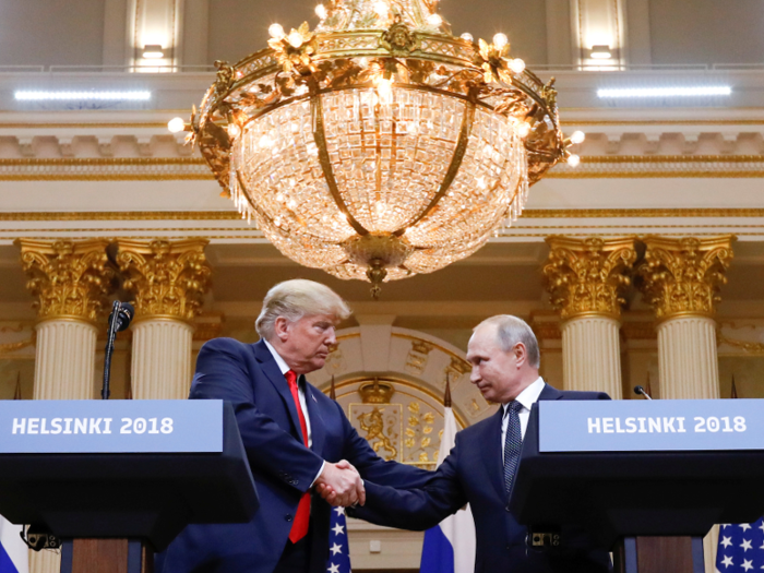 July 16, 2018: Trump shakes hands with Russian President Vladimir Putin during a joint news conference after their meeting in Helsinki, Finland.