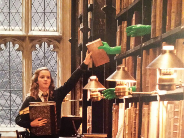 Green gloves were used to make the books fly around in the Hogwarts library.