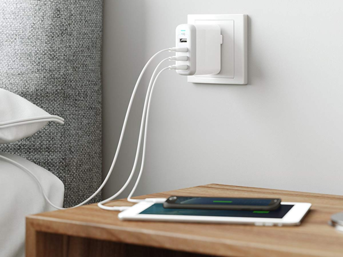 A universal USB wall charger that fits four devices