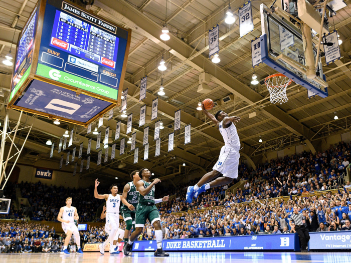 Duke freshman phenom Zion Williamson soars through the air for the massive dunk.