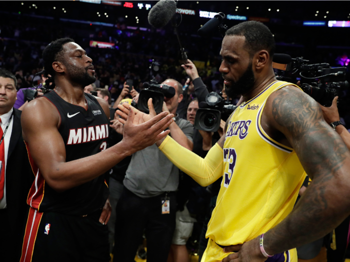 LeBron James and Dwayne Wade shake hands after their final NBA matchup ever.