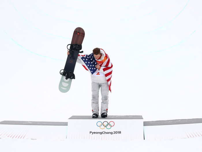 Legendary U.S. snowboarder Shaun White takes a bow after a near-perfect performance in the Men