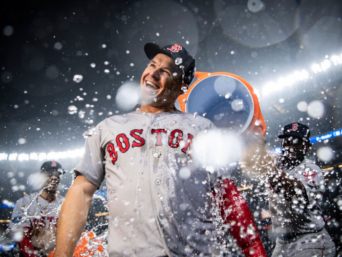 Teammates douse Brock Holt with Gatorade after hitting for the cycle in Game 3 of the ALDS against their arch rival New York Yankees.