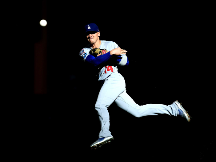 Enrique Hernandez of the Los Angeles Dodgers fields the ball in Game Two of the NLCS.