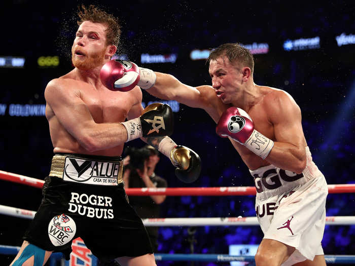 Gennady Golovkin connects while fighting Canelo Alvarez for another epic 12 rounds.