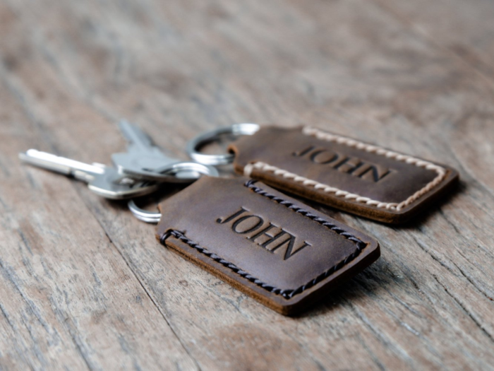 Two personalized leather keychains