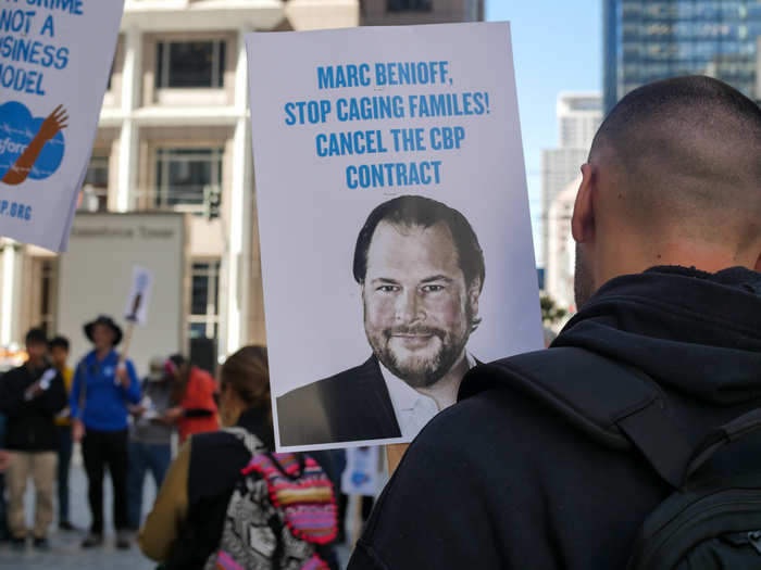 Activists marched outside of the Salesforce headquarters in San Francisco to protest the company