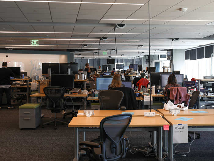 The office space shows the level of detail you might expect with that pedigree. Every desk is on wheels, says Russell, to enable people to move freely between teams and set up ad-hoc working groups. The power cables dangle from the ceilings, such that you