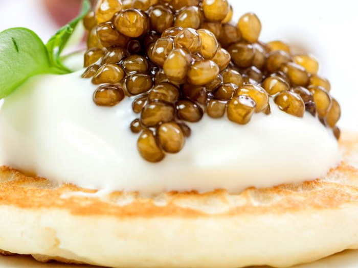 The best blinis, creme fraiche, and champagne for your caviar