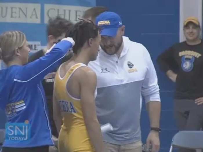 The New Jersey Civil Rights Division will investigate a white referee who forced a high school wrestler to cut off his dreadlocks or forfeit a match.