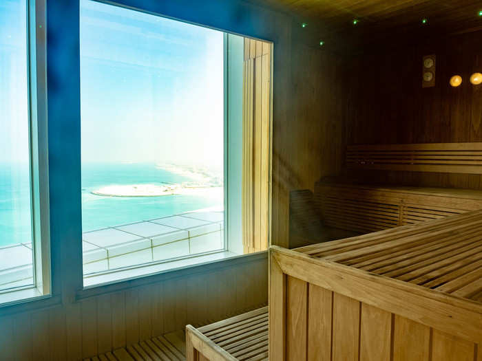 The sauna looks out to the Arabian Gulf, the Palm Jumeirah (the world