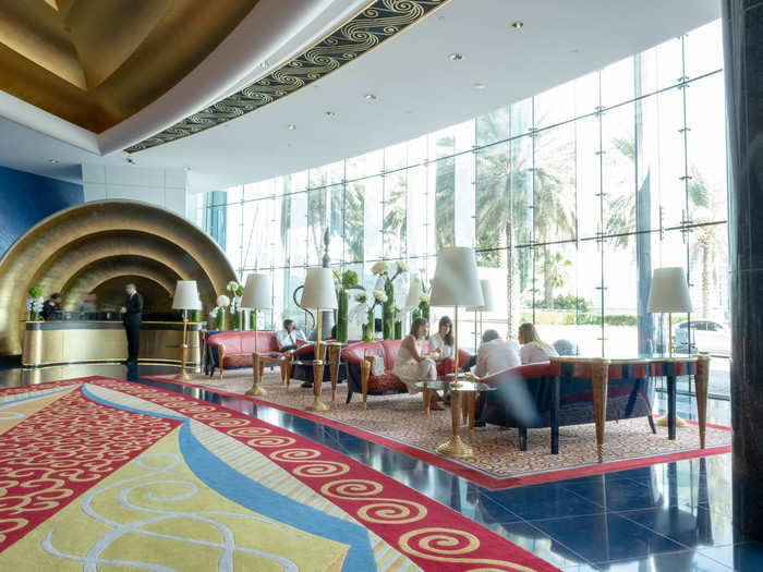 Compared to the rest of the Burj, the lobby is nothing to write home about, with low ceilings and a pared-back design. But that