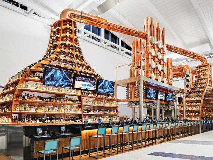 The long bar has two towers that showcase a variety of whiskeys.