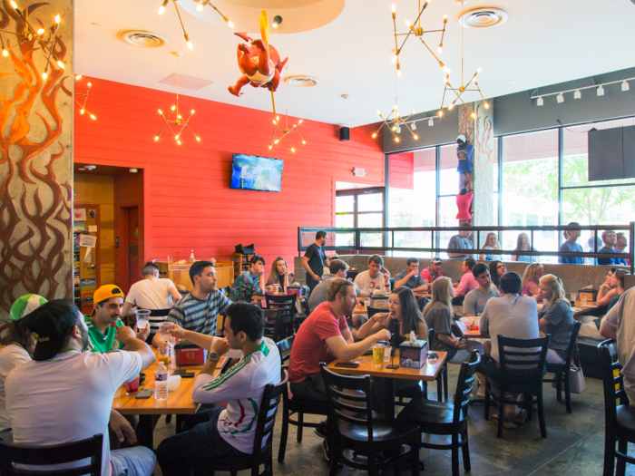 Before noon, the restaurant was already packed. Hungover college students were inhaling tacos alongside families and World Cup fans sipping beers.