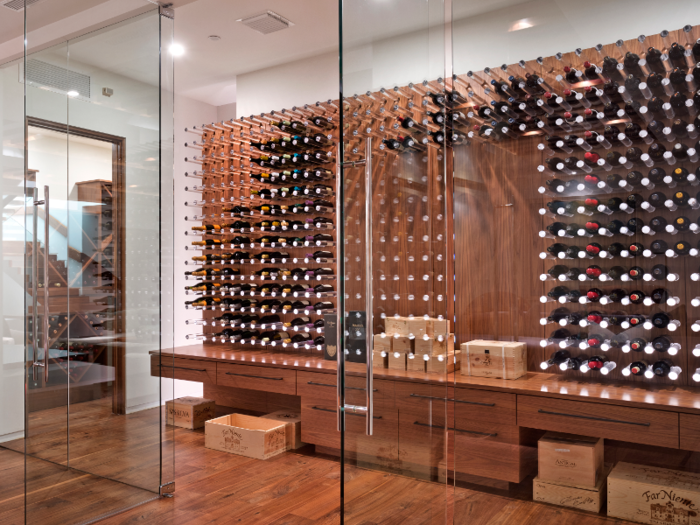 But the most impressive part of the lower level just might be the wine cellar, which appears to have room for hundreds of bottles.