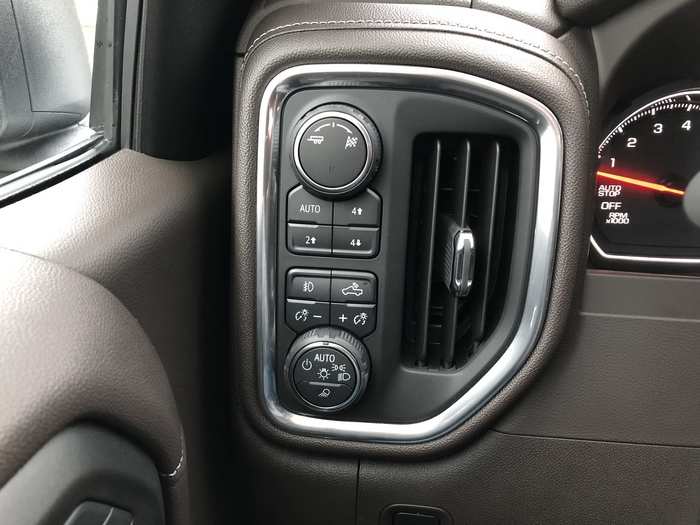 The drivetrain controls are located to the left of the steering wheel.