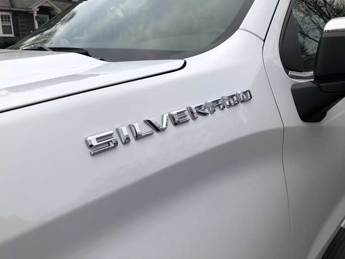 The nameplate is rendered, naturally, in silvery chrome.