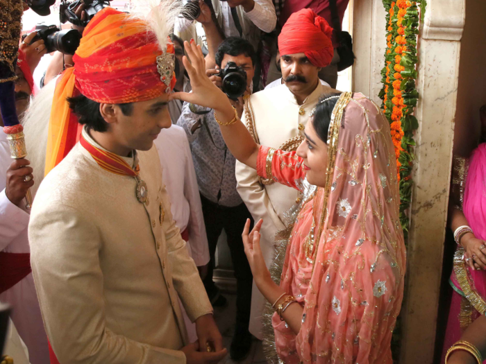 Here, Singh is greeted by his younger sister, Princess Gauravi Kumari.