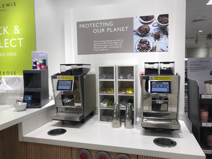 The entrance area was enticing — fresh fruit and vegetables were front and center, and there was a coffee station to the left.