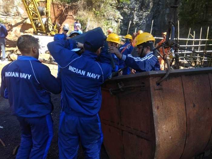 The Odisha firefighters and the Indian Navy were called in to assist with the rescue efforts. The firemen are helping dewater the mine, while the Indian Navy has sent in divers.