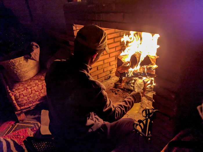 Thankfully, the camp had a fireplace built into the tent. Once this fire was burning, the tent got nice and toasty.