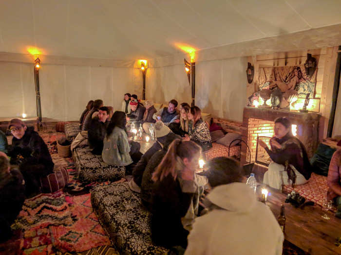 After enjoying the tea and popping our bottle of wine, it was time for dinner. We headed up to the big tent at the top of the camp where dinner was to be served. We weren’t the only ones looking to fill their stomachs before the festivities really kicked in.