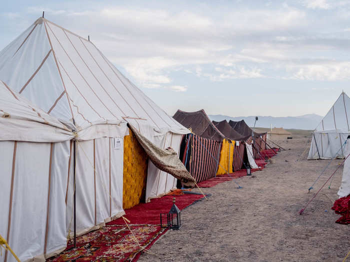 After setting up our stuff in the tent and putting on a few more layers — it was chilly even before nightfall — we went to have a walk around the camp and take a peek into some of the other tents.