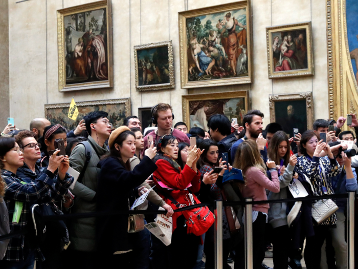 Considering the number of people who visit the Louvre each day and that most of them will want a glimpse (and a photo) of the Mona Lisa, it