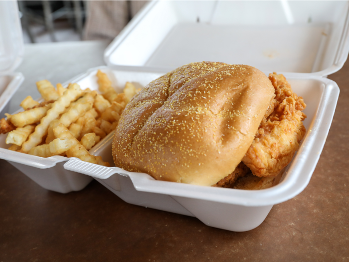 We surveyed the sandwich: three golden chicken fingers nestled between two Kaiser Rolls.