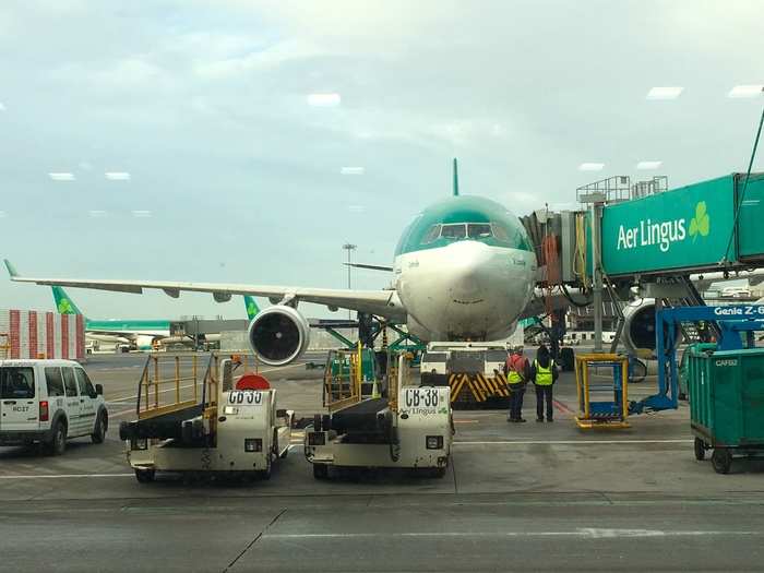 After emerging from the security checkpoint and CBP station, we found ourselves on the lower level of the airport. This gave us the chance to get this awesome shot of an Aer Lingus Airbus A330.